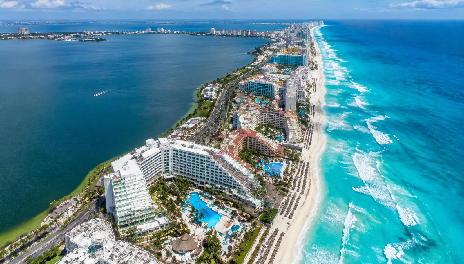 Aerial view of the Cancun Hotel Zone between lagoon and sea